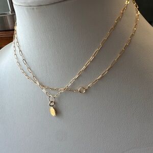 Set of two tiny gold filled paper clip necklaces. One with tiny coin